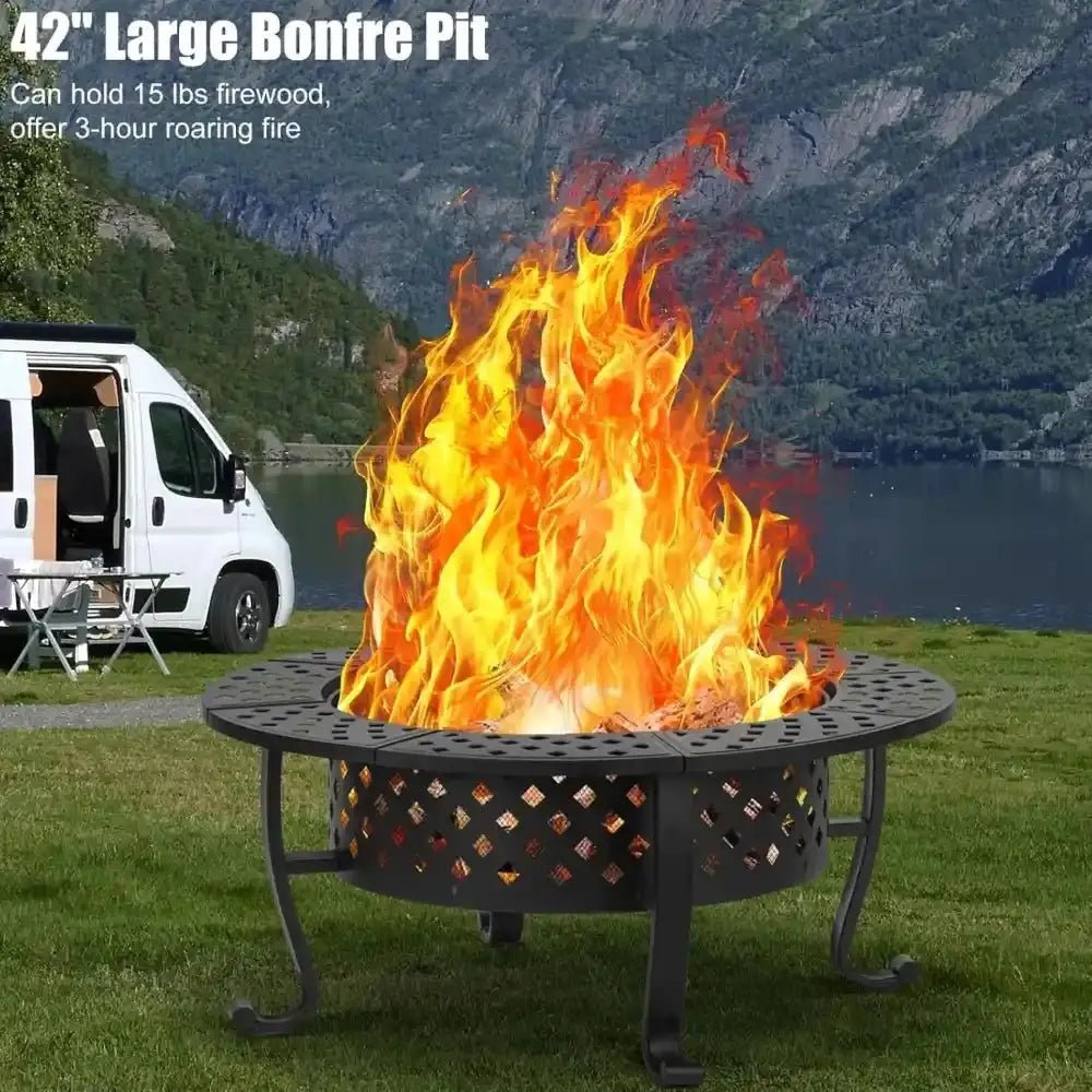 42" Large Bonfire Pit with flames in front of a scenic background with a van and lake.